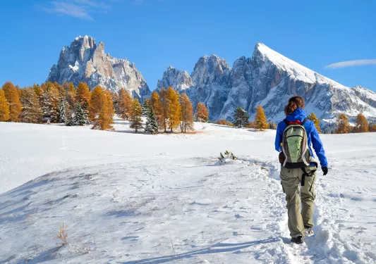 A person hiking in the snow