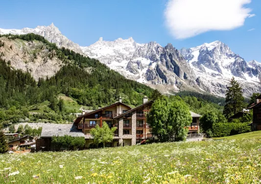 chalet style hotel nestled in the mountains