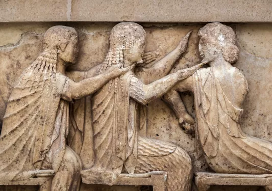 Figures etched carved into stone