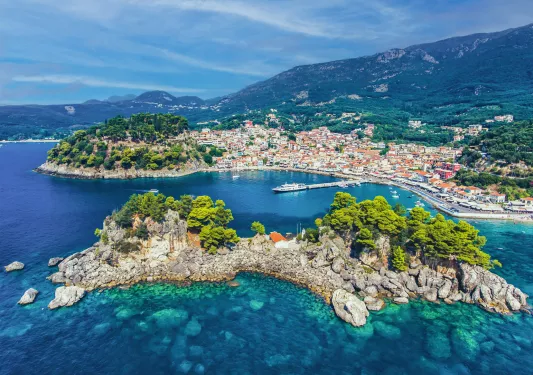 View of cottage lined islands in clear blue water