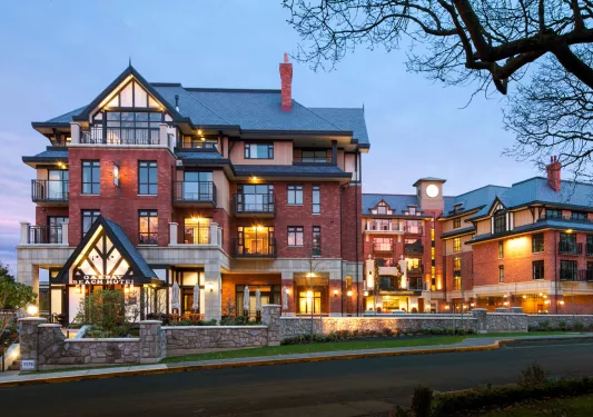 Oak Beach Hotel lit up at dusk