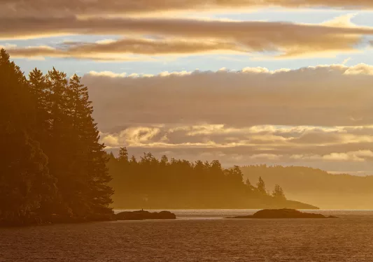 Ocean with a few large rocks sticking out of the water