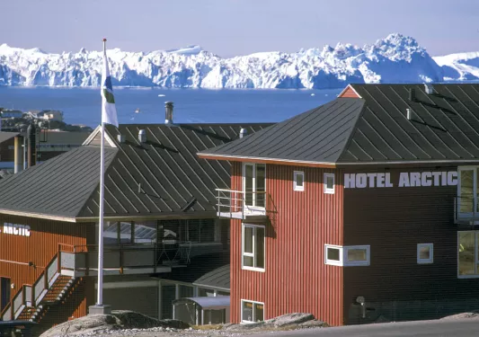 Hotel with icebergs in the background