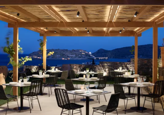 Outdoor dining patio area looking out to the ocean