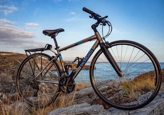 Backroads branded bike on a hillside