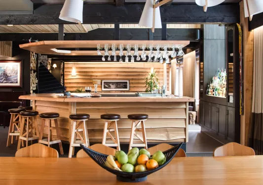 bowl of fruit on wooden bar