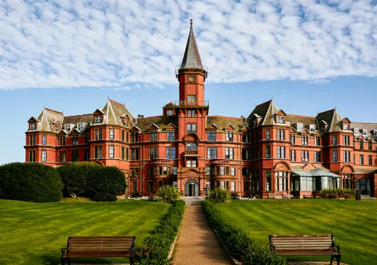 Outdoor wide shot of castle-like building
