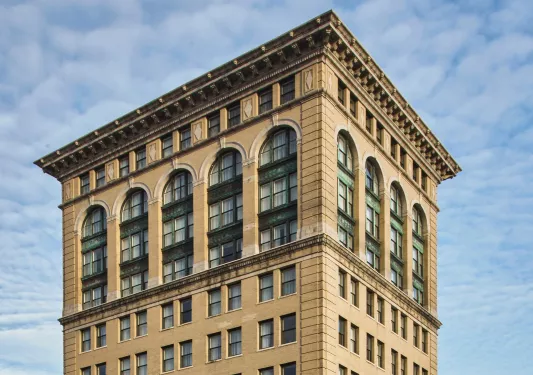 Exterior view of a hotel building's top floors