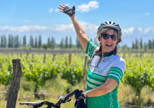 a backroads guest poses with their bike