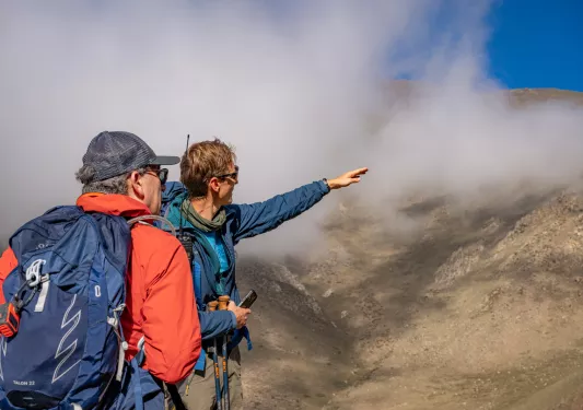hikers on a foggy mountain