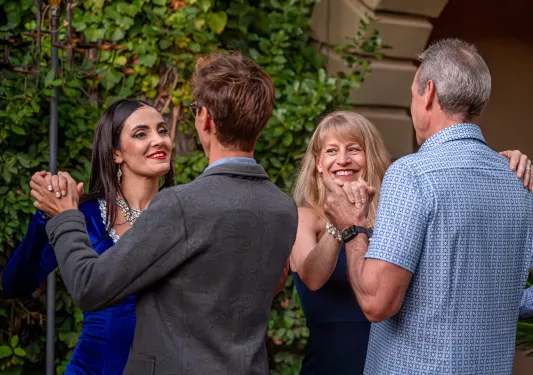 two couples dancing