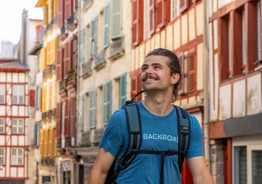 Backroads guest walking through a city