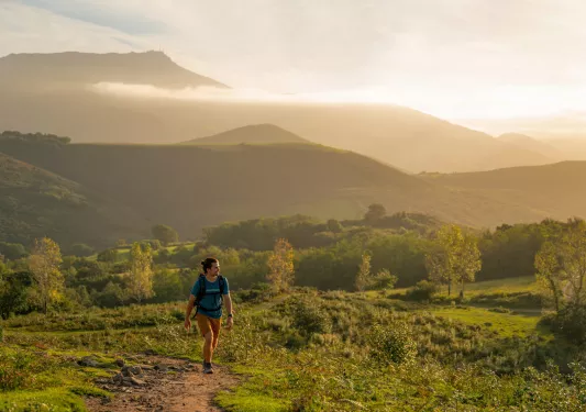 Backroads guest hiking in the sunset