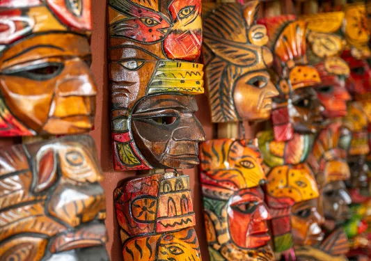 Carved, wooden mini totem poles