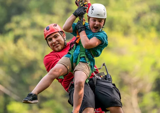 Father and son on a zipline