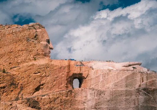 canyons against a blue cloudy sky