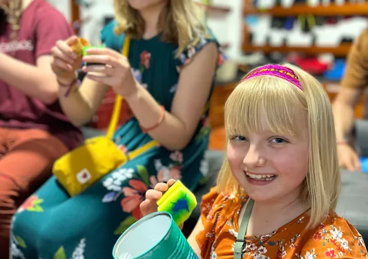 Two children doing crafts
