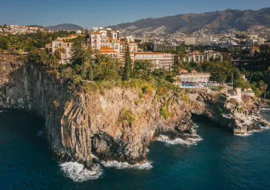 Large hotel building on an oceanside cliff