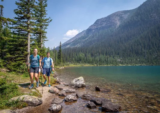 backroads guests hiking by a lake