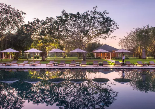 pool with lounge chairs