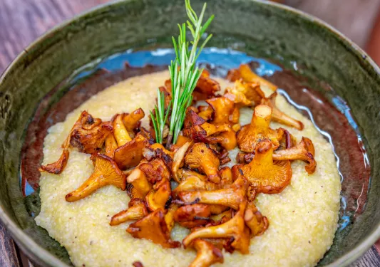 Brown with grits and roasted mushrooms