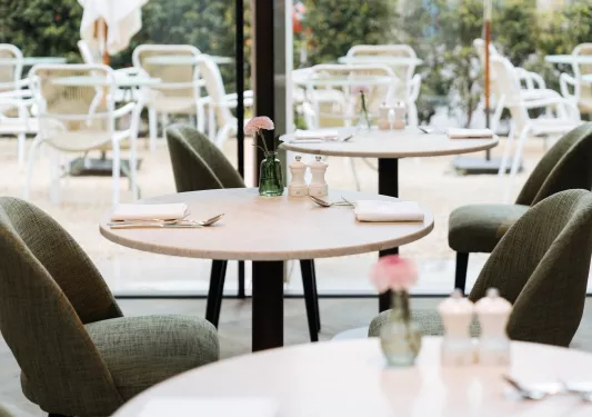 dining tables with green chairs