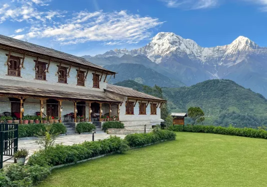 sprawling lawn with hotel in background
