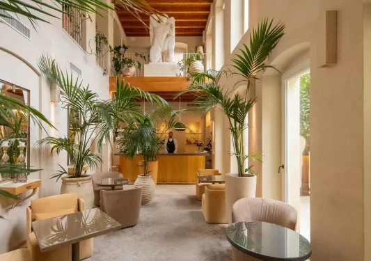 hotel lobby with palm fronds