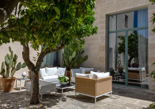 outdoor patio with seating and trees