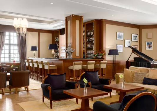 sleek hotel bar with seating