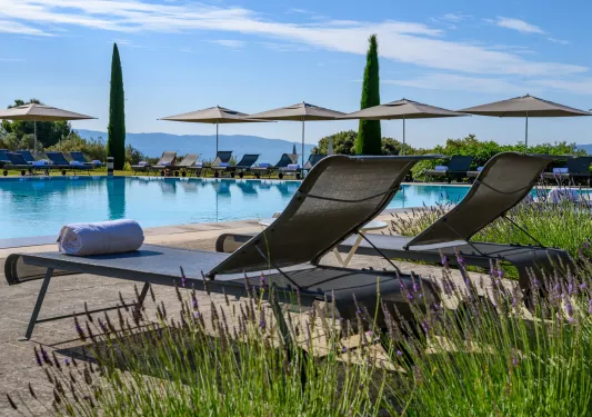 lounge chairs by the pool