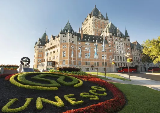large hotel with manicured lawns