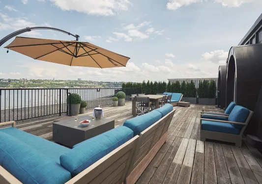 deck with patio furniture and umbrellas