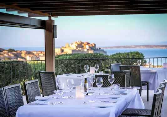 table with settings overlooking sunset