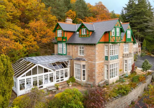 exterior of hotel surrounded by trees