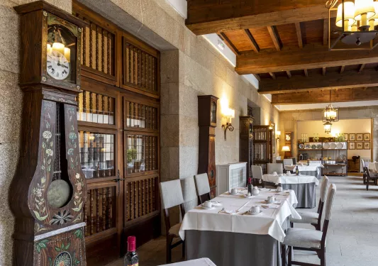 grand hotel restaurant decorated with grandfather clocks