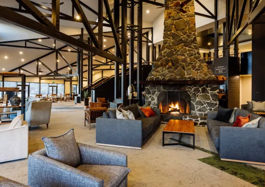 large lodge with stone fireplace