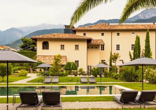 Yellow building with an outdoor pool