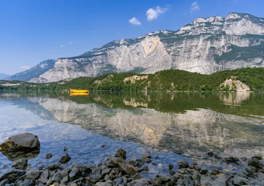 Yellow kayak in the middle of a lake
