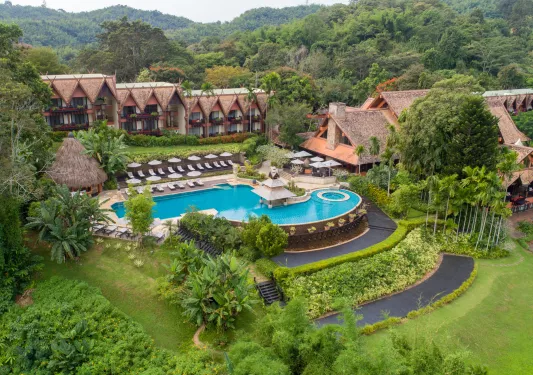 hotel and pool forested area