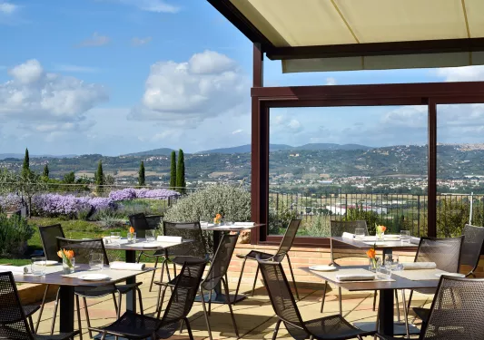 patio with dining furniture and view