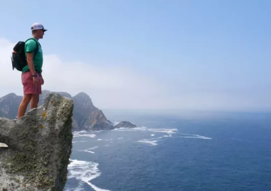 Man looking at the ocean from above