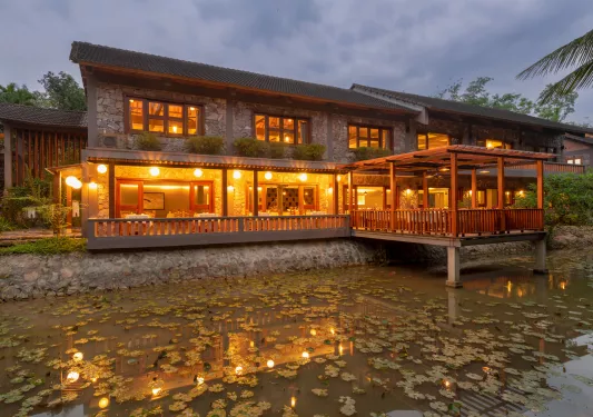 lit up deck next to the river