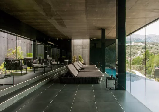 lounge chairs overlooking a pool