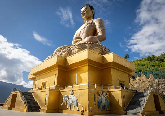 Large temple with a Buddhist statue on top