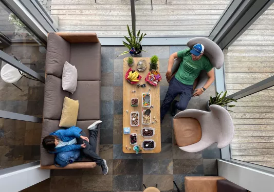 guests relaxing in living room 