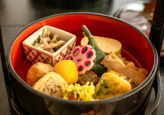 Bowl full of Japanese meats and vegetables