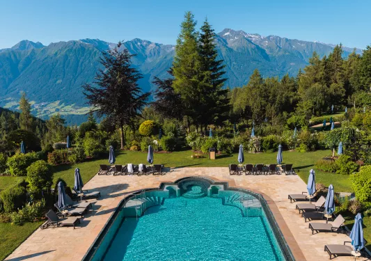 pool with lounge chairs