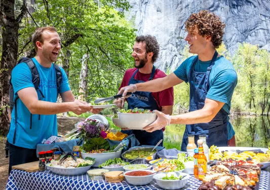 Backroads leaders serving a picnic