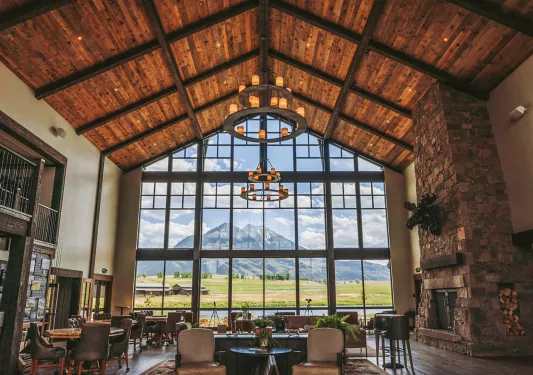 room with high vaulted ceilings and light fixtures